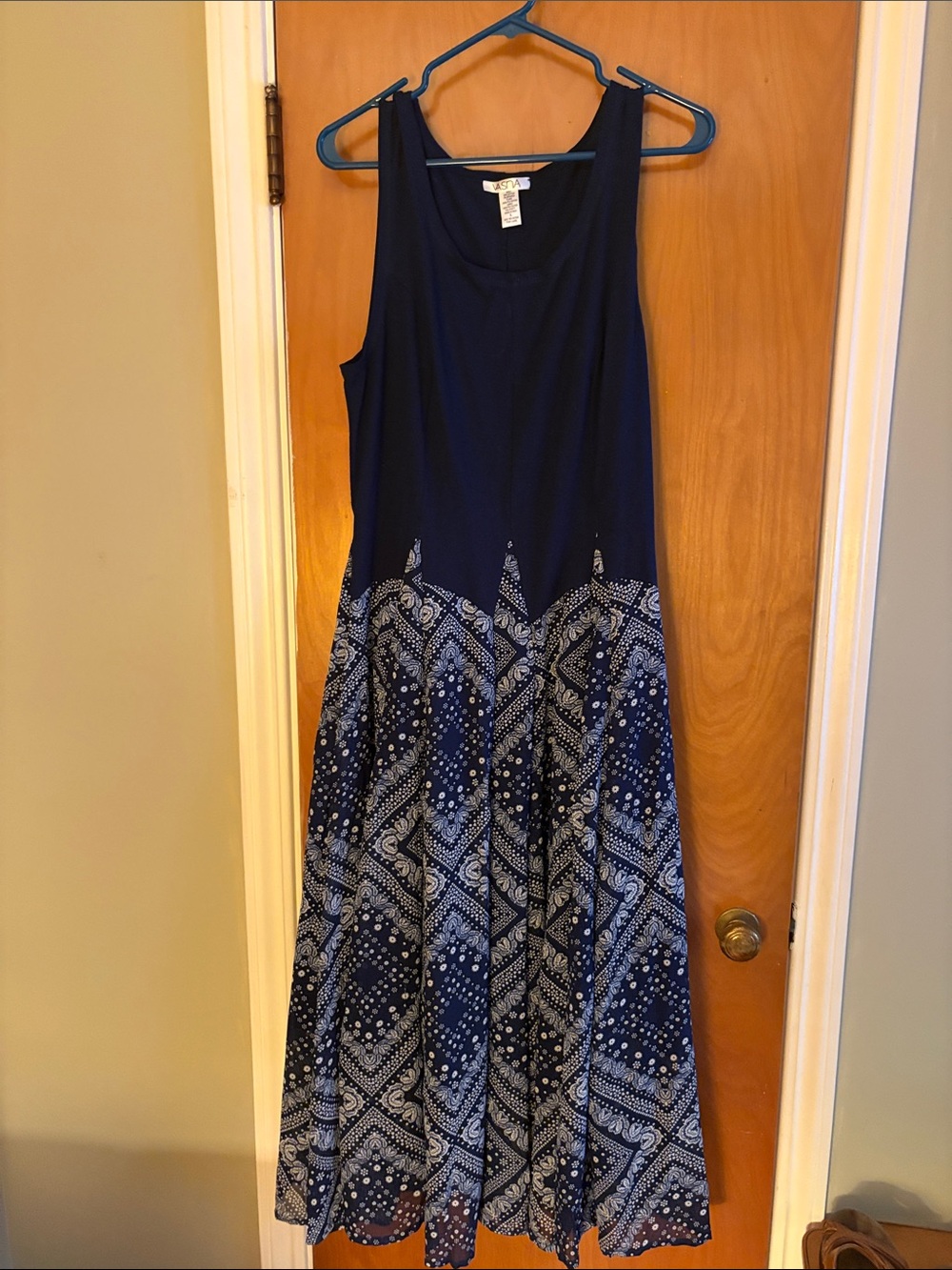 One piece navy and white lined bandana dress with under neath tabs for crunching